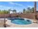 Inviting backyard pool with cool blue water and lush landscaping creates a relaxing and private outdoor space at 9632 E Olla Ave, Mesa, AZ 85212
