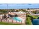 Aerial view of community pool and amenity center featuring lush landscaping and a serene atmosphere at 10377 W Yukon Dr, Peoria, AZ 85382