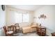 Bedroom with neutral walls, unique furniture, and modern decor at 10377 W Yukon Dr, Peoria, AZ 85382