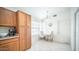 Breakfast nook with cabinets, window and hanging light fixture at 10377 W Yukon Dr, Peoria, AZ 85382