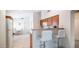 Efficient kitchen with a cozy breakfast bar, seamlessly connecting to the dining area at 10377 W Yukon Dr, Peoria, AZ 85382