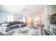 Spacious living room with comfortable seating and seamless flow to other living areas at 10377 W Yukon Dr, Peoria, AZ 85382