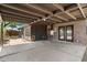 Spacious covered back patio with brick accents and room for outdoor entertaining at 105 E Hermosa Dr, Tempe, AZ 85282