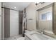 Clean bathroom featuring tiled shower with a glass shower screen and modern vanity at 105 E Hermosa Dr, Tempe, AZ 85282