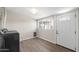 Functional laundry room with modern washer-dryer, window, and convenient exterior access at 105 E Hermosa Dr, Tempe, AZ 85282