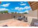 Outdoor backyard space featuring a table and chairs, perfect for relaxing and entertaining guests at 1055 N 86Th Pl, Scottsdale, AZ 85257