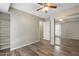 Inviting bedroom featuring closet, wood-look flooring, and ample closet space for storage at 1055 N 86Th Pl, Scottsdale, AZ 85257