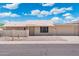 Single-story home featuring a two-car garage and neutral exterior paint at 1055 N 86Th Pl, Scottsdale, AZ 85257