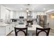 Bright kitchen features white cabinets, stainless steel appliances, and a center island at 1055 N 86Th Pl, Scottsdale, AZ 85257