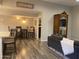 Open-concept living space with sleek floors, comfortable seating, and a dining area adjacent to the kitchen at 1055 N 86Th Pl, Scottsdale, AZ 85257
