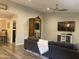 Contemporary living room with hard wood floors and comfortable sectional at 1055 N 86Th Pl, Scottsdale, AZ 85257