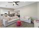Bright living room with modern sofas that opens into the kitchen and dining area at 1055 N 86Th Pl, Scottsdale, AZ 85257