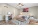 Well-lit main bedroom with decorative art, desk, and zebra rug for a modern touch at 1055 N 86Th Pl, Scottsdale, AZ 85257