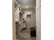 Spacious walk-in closet with custom shelving, providing ample storage and organization for a well-curated wardrobe at 1055 N 86Th Pl, Scottsdale, AZ 85257