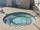 Inviting spa with tiled edges provides a relaxing experience for residents and guests at 1124 E Rose Ln # 17, Phoenix, AZ 85014