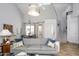 Open concept living room showcases neutral walls, tile floors, modern furnishings, and plenty of natural light at 1124 E Rose Ln # 17, Phoenix, AZ 85014