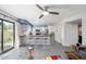 Open living area connecting kitchen and living room with modern finishes and ample light at 1124 E Rose Ln # 17, Phoenix, AZ 85014