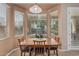 Cozy breakfast nook with bay windows provides natural light and a charming spot for casual dining at 12417 W Apache St, Avondale, AZ 85323