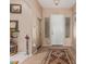 Welcoming foyer featuring tile flooring, a decorative rug, and neutral wall color at 12417 W Apache St, Avondale, AZ 85323