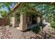 Charming front porch with decorative columns and desert landscaping at 12417 W Apache St, Avondale, AZ 85323