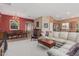 Spacious living room flows into dining area, showcasing neutral walls and comfortable seating arrangements at 12417 W Apache St, Avondale, AZ 85323