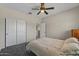 Comfortable bedroom featuring a bed, closet, and en suite access at 1250 E Canyon Creek Dr, Gilbert, AZ 85295