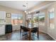 Light filled dining area features tile floors and a table with seating for four at 1250 E Canyon Creek Dr, Gilbert, AZ 85295