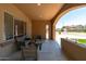 Inviting front porch area with comfortable seating and a view of the neighborhood street at 1250 E Canyon Creek Dr, Gilbert, AZ 85295