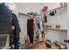 Well-organized walk-in closet with clothing racks, shelves, and shoe storage at 1250 E Canyon Creek Dr, Gilbert, AZ 85295