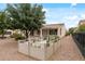 Well maintained backyard featuring a raised garden bed and covered patio, perfect for gardening and outdoor living at 13414 W San Pablo Dr, Sun City West, AZ 85375