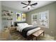 Charming bedroom featuring ample natural light, stylish decor, and a cozy, inviting atmosphere at 13414 W San Pablo Dr, Sun City West, AZ 85375