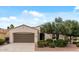 Inviting single-story home featuring desert landscaping, a two-car garage, and a neatly maintained front yard at 13414 W San Pablo Dr, Sun City West, AZ 85375