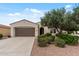 Single-story home with desert landscaping, a two-car garage, and a quaint front entrance, creating an inviting curb appeal at 13414 W San Pablo Dr, Sun City West, AZ 85375