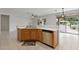 Well-lit kitchen area featuring stainless steel appliances and light countertops at 13414 W San Pablo Dr, Sun City West, AZ 85375