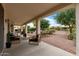 Outdoor patio area perfect for lounging with comfortable seating and views of the landscaped backyard at 13414 W San Pablo Dr, Sun City West, AZ 85375