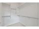 Walk-in closet with carpet and built-in shelving at 13414 W San Pablo Dr, Sun City West, AZ 85375