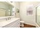 Clean bathroom featuring wood floor, modern sink and a shower at 1492 E Westchester Dr, Chandler, AZ 85249