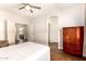Bright bedroom with laminate flooring and neutral walls for customizable decor at 1492 E Westchester Dr, Chandler, AZ 85249