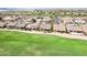 An aerial view showing community with greenbelts and nearby golf course at 16165 W Vale Dr, Goodyear, AZ 85395