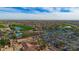A beautiful aerial view showing community pool, golf and tennis courts at 16165 W Vale Dr, Goodyear, AZ 85395
