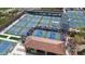 Community pickleball complex featuring multiple courts and spectator seating, promoting an active and social lifestyle at 16165 W Vale Dr, Goodyear, AZ 85395
