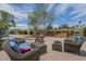 Relaxing backyard with an outdoor seating area and a covered hot tub, ideal for enjoying leisure time at 1637 W University Dr, Mesa, AZ 85201