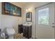 Bright bathroom featuring a vanity with sink, an art piece and mosaic tile flooring at 1637 W University Dr, Mesa, AZ 85201