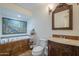 Inviting bathroom featuring a relaxing soaking tub and elegant fixtures at 1637 W University Dr, Mesa, AZ 85201