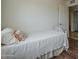 Inviting bedroom with wood floors and a comfy bed at 1637 W University Dr, Mesa, AZ 85201