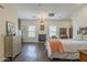 Bright bedroom with a cozy fireplace and a vintage mini refrigerator at 1637 W University Dr, Mesa, AZ 85201