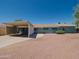 Charming single-story home with a carport and low-maintenance landscaping at 1637 W University Dr, Mesa, AZ 85201