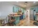 Modern kitchen with vintage-style range and breakfast bar area at 1637 W University Dr, Mesa, AZ 85201