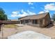 Extensive backyard showcasing the home's outdoor living space, patio, and perimeter fencing at 1669 E Santa Fiore St, San Tan Valley, AZ 85140