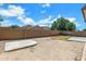 Large backyard with patio area, offering plenty of space for outdoor activities at 1669 E Santa Fiore St, San Tan Valley, AZ 85140